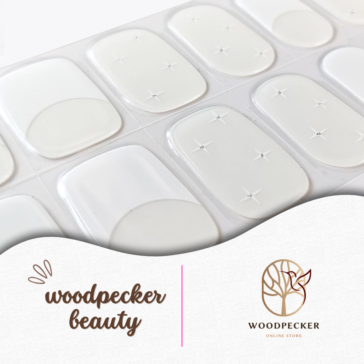 Nude-white gel nail stickers with subtle dot patterns resembling soft starry details from Woodpecker Beauty