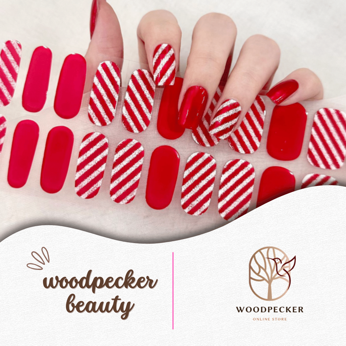 Christmas-themed nail stickers with red and white diagonal candy cane stripes and solid red accents.