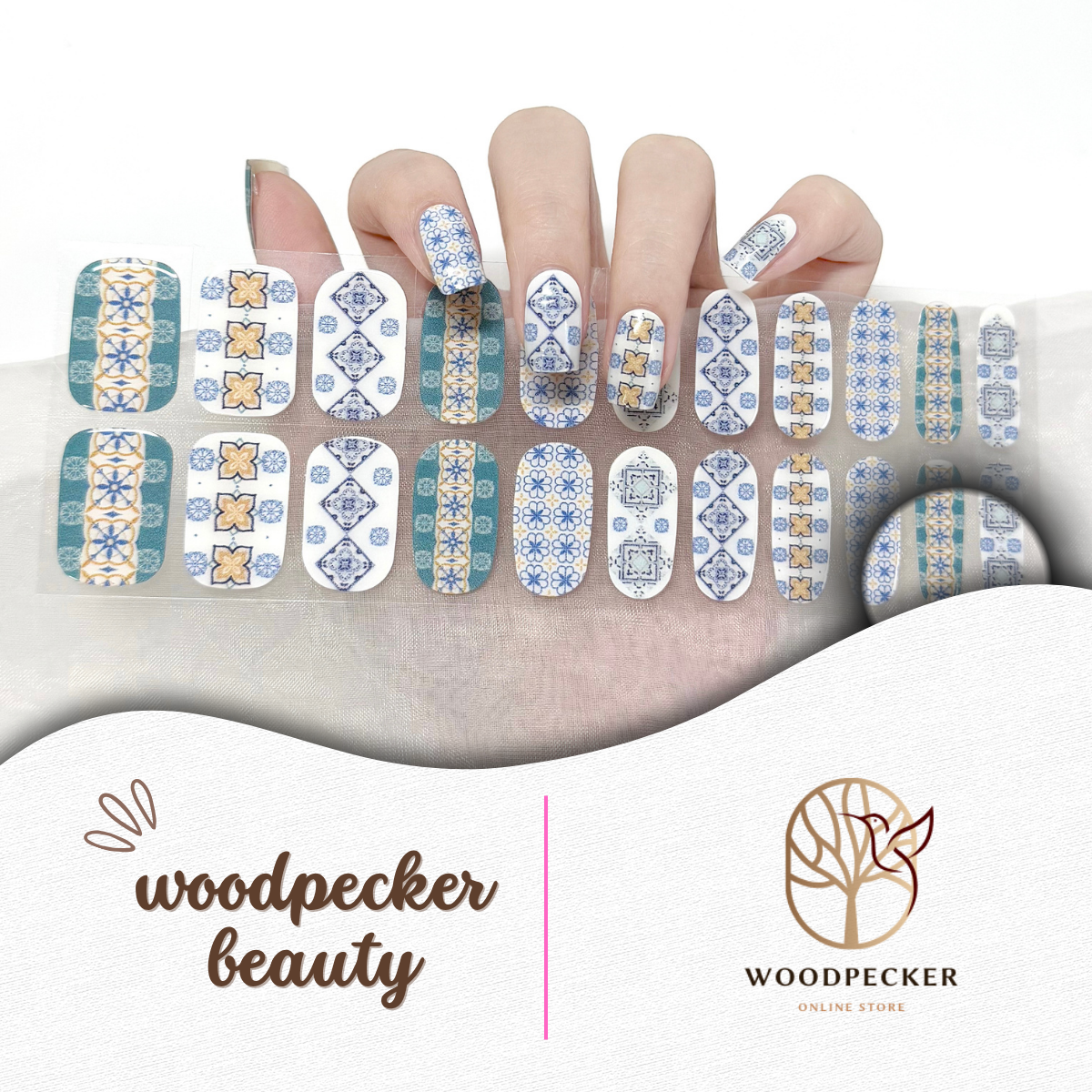 Blue and terracotta Medina tile pattern semi-cured gel nail stickers on hand