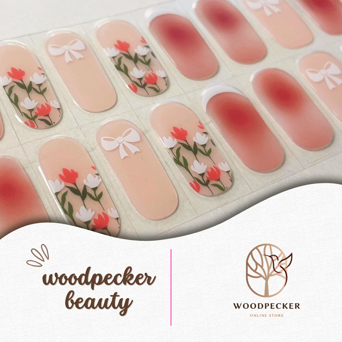 Pink gradient nail stickers with rose and petal prints in soft tones.