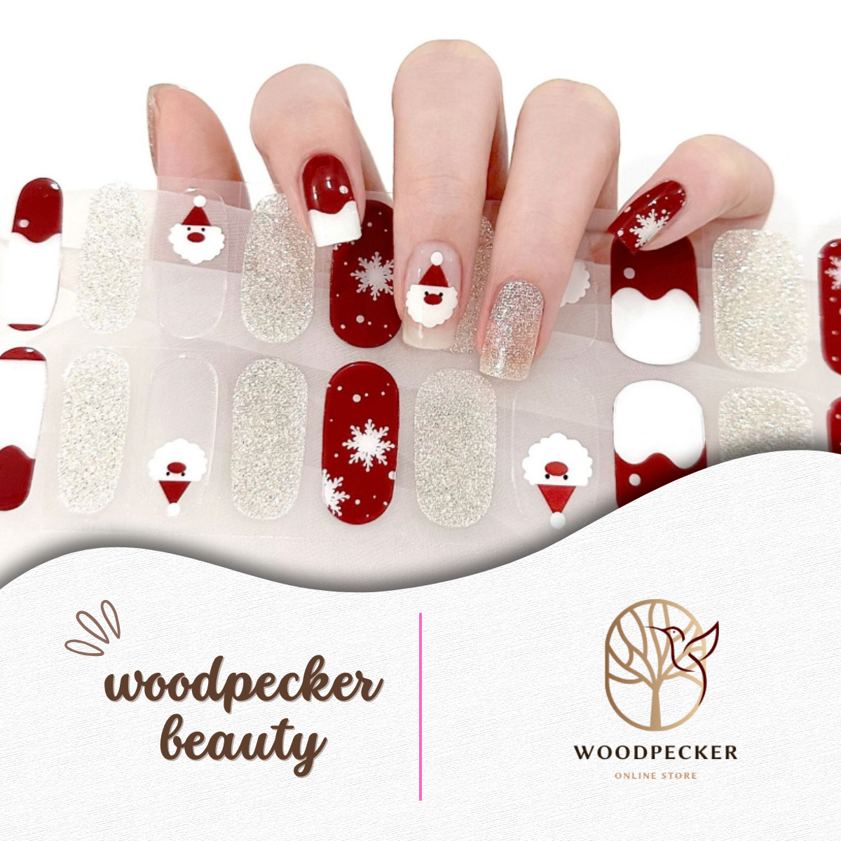 Christmas-themed semi-cured gel nail wraps featuring Santa faces, red snowflakes, and silver glitter accents