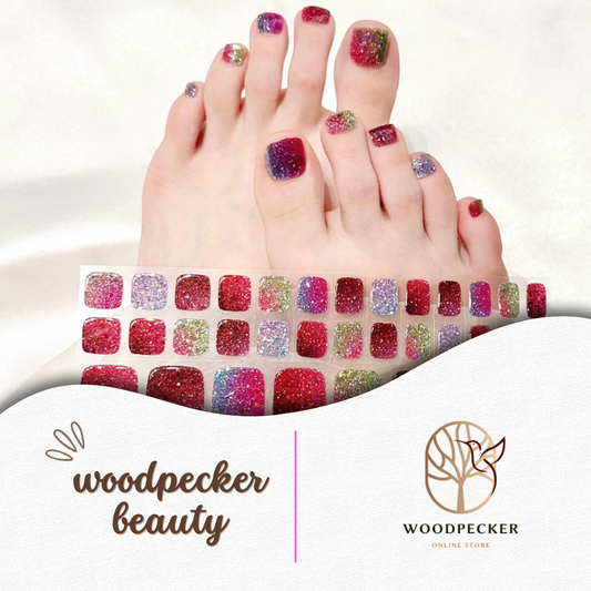 glitter ombre red pink green gel toe nail stickers with sparkly finish applied on toes
