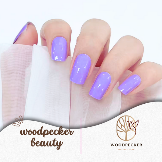 Shiny purple gel nail stickers applied on nails with semi-transparent fabric – Woodpecker Beauty