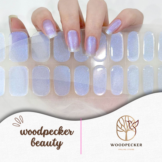 Icy lilac-blue semi-cured gel nail stickers with a sheer shimmer finish from Woodpecker Beauty
