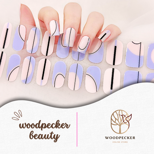 Semi-cured gel nail stickers in nude and lavender tones with abstract black line art design from Woodpecker Beauty

