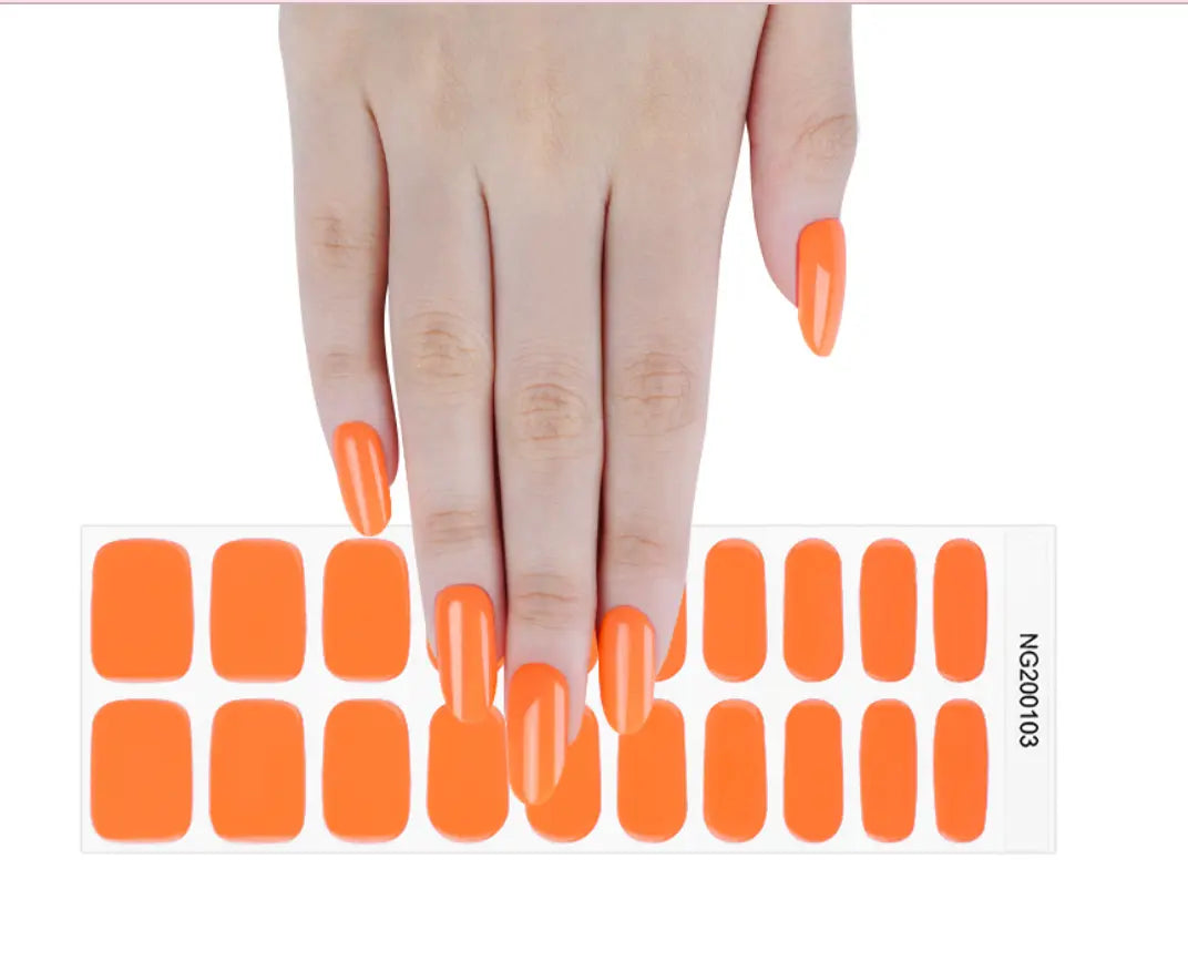 Size comparison of orange gel nail wraps with hand for fit preview – Woodpecker Beauty