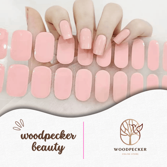 Hand with soft pink glossy gel nail stickers and matching full sheet – Woodpecker Beauty
