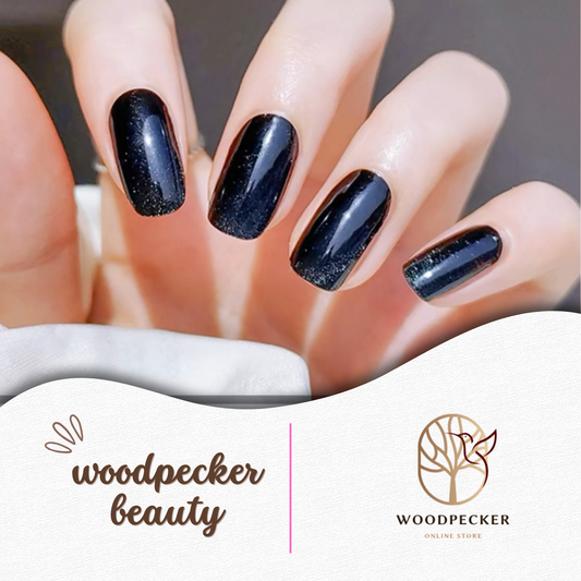 Glossy black nail stickers with subtle glitter, perfect for a chic and minimal manicure look
