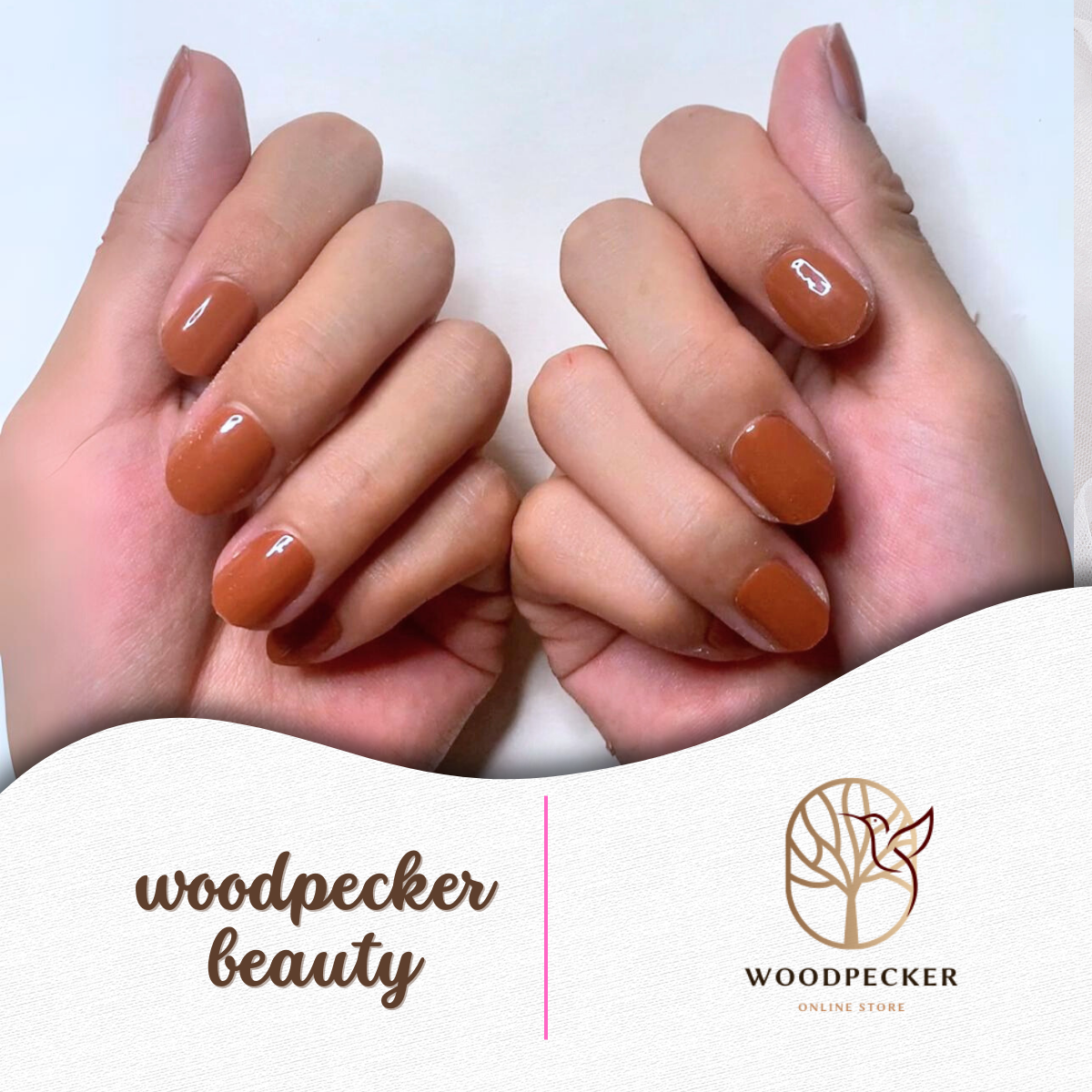 Both hands showing warm caramel gel nail stickers in a cozy natural light setting.
