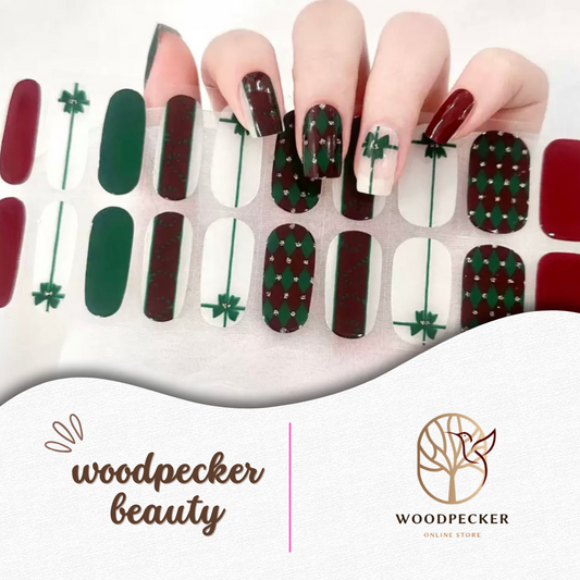 Christmas-themed nail stickers with deep red and green tones, featuring argyle patterns, gift bow designs, and festive accents.
