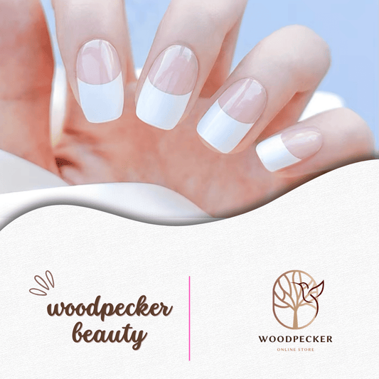 French manicure-style nail stickers with crisp white tips and a natural pink base.
