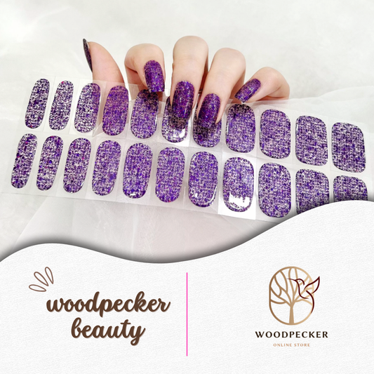 Glossy nail stickers fully covered in chunky purple glitter for a bold and sparkling finish.
