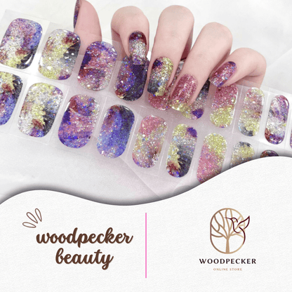 Colorful galaxy-inspired nail stickers with chunky glitter, rainbow gradients, and shimmering effects.
