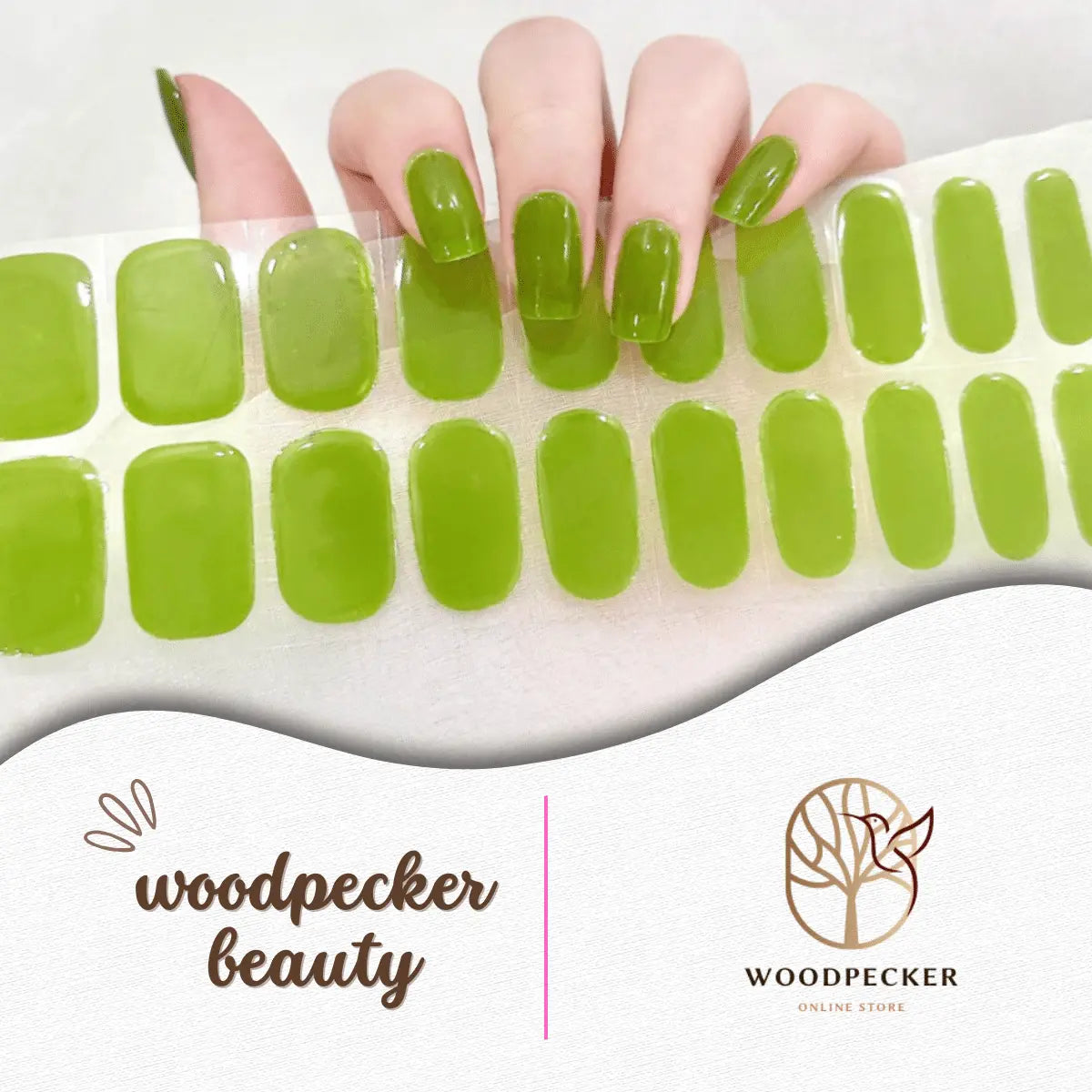 Glossy apple green nail stickers with a fresh and vibrant finish, displayed on a hand and full sheet.

