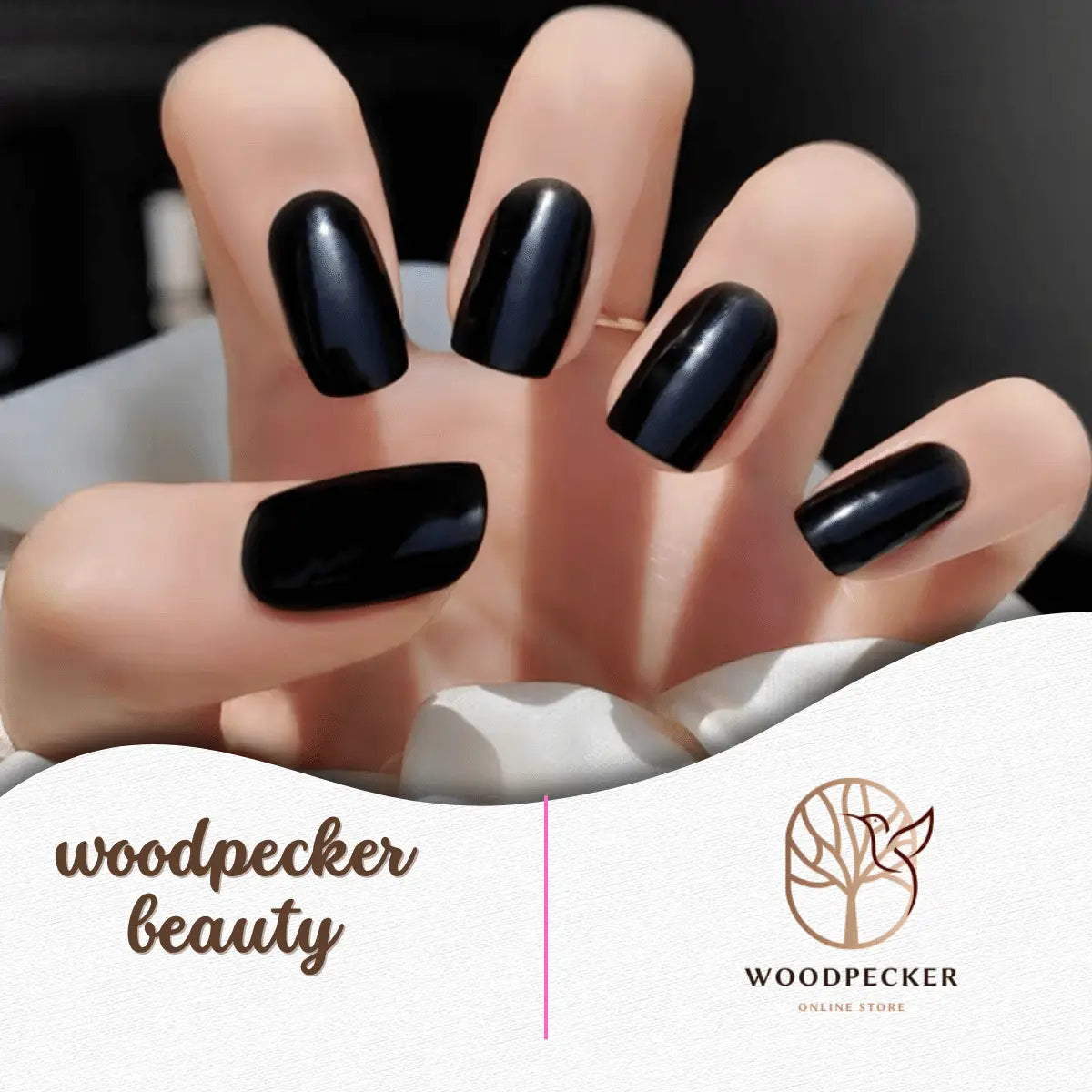 Hand wearing glossy black nail stickers with a smooth, high-shine finish.
