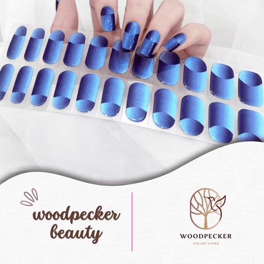 Metallic blue nail stickers with cat-eye magnetic effect and reflective satin finish.
