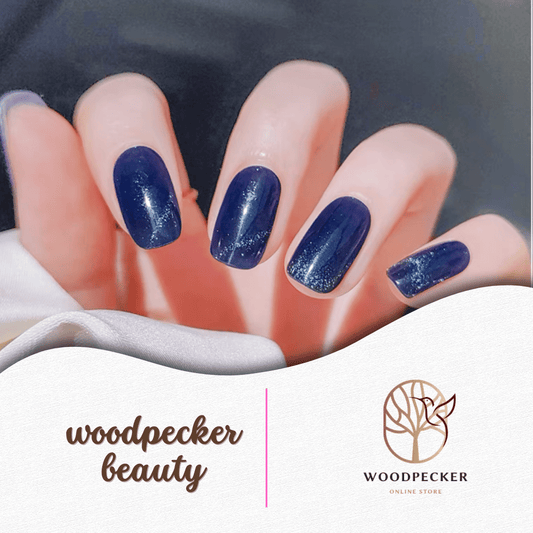 Deep midnight blue nail stickers with subtle shimmer and starry streaks.
