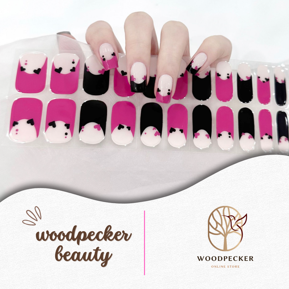 Pink and black semi-cured gel nail stickers with heart accents — bold and playful nail art design

