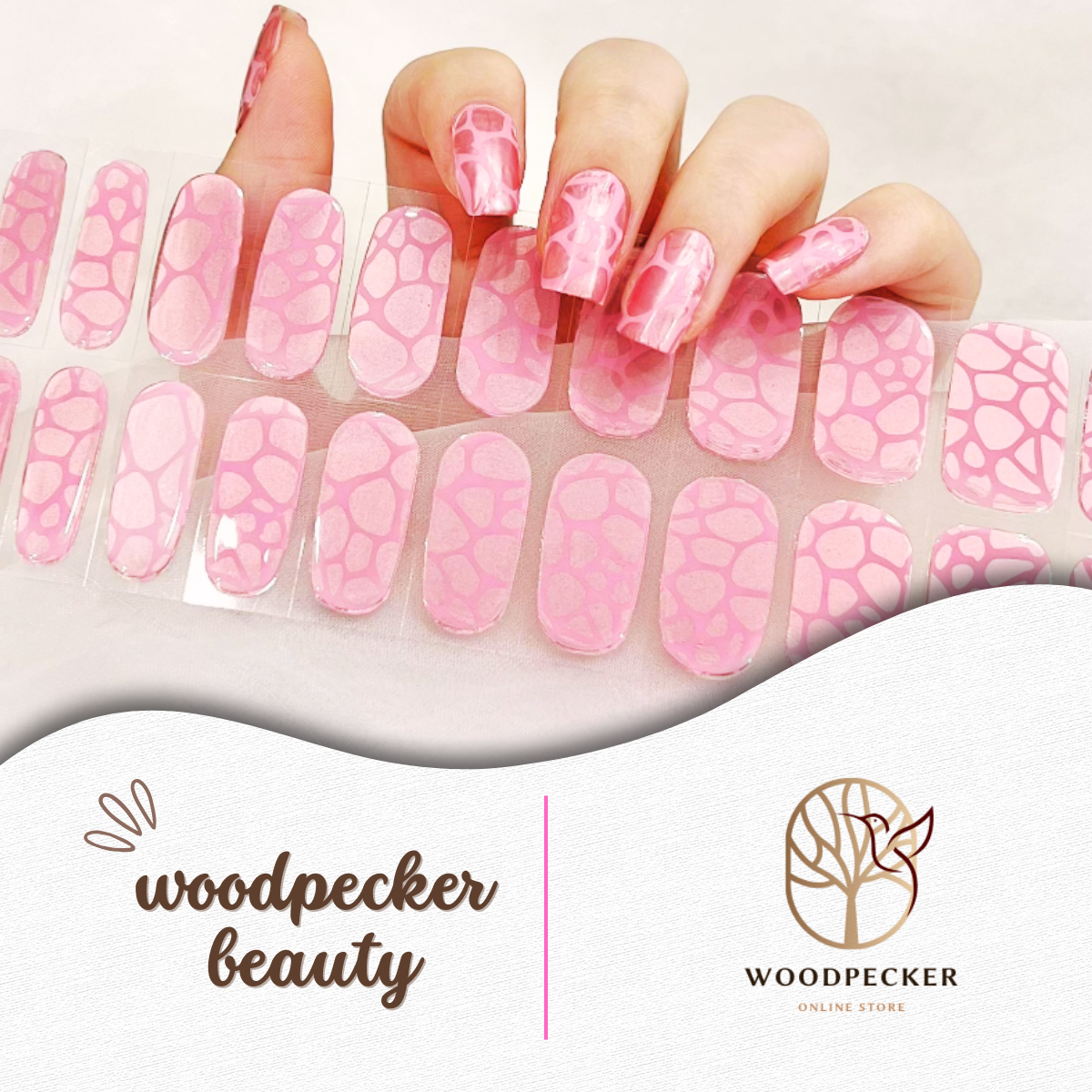 Semi-cured gel nail wraps with candy pink base and giraffe-style abstract pattern, UV lamp required
