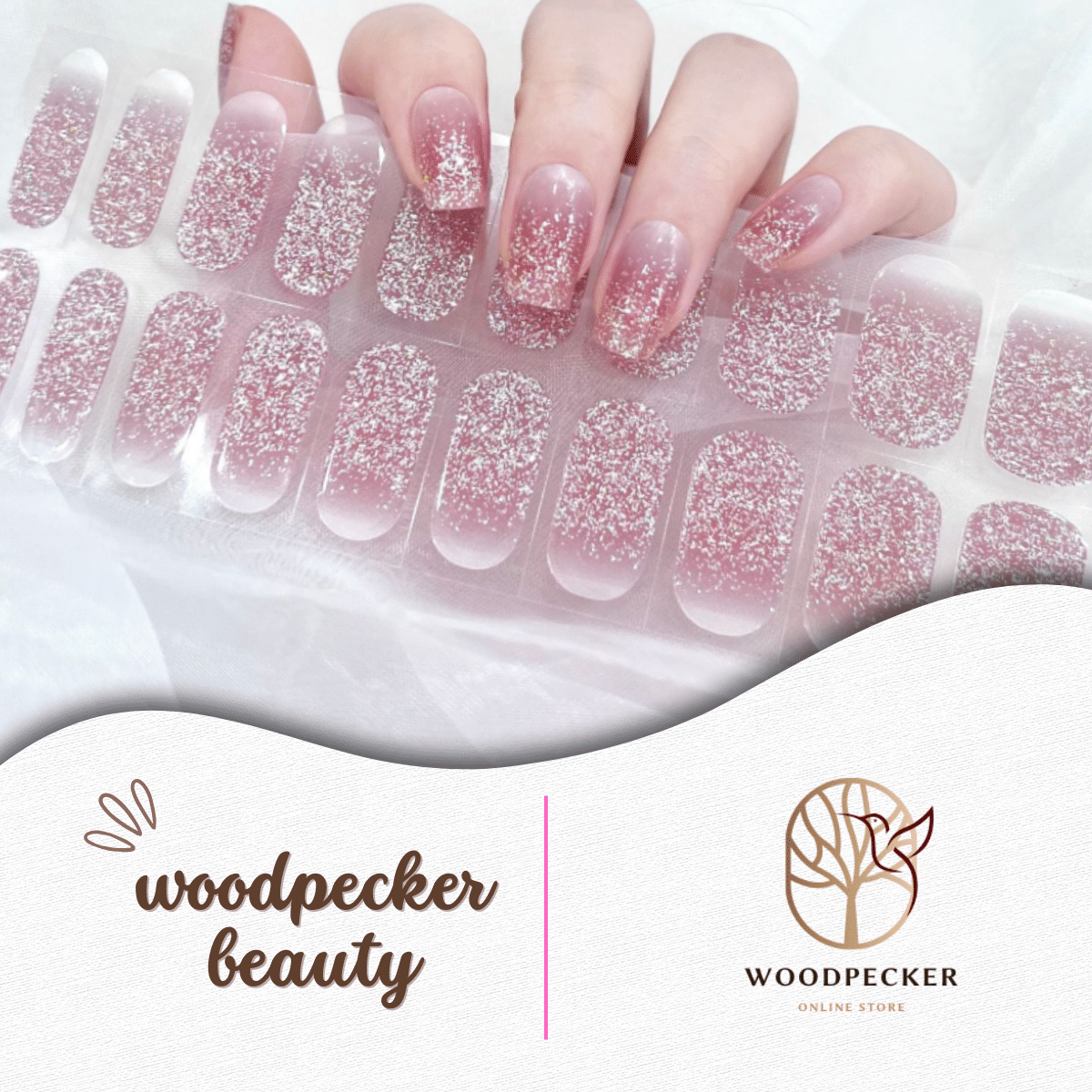 Nail stickers with pink glitter gradient fading from nude base to tips, creating a soft and sparkly ombré look.
