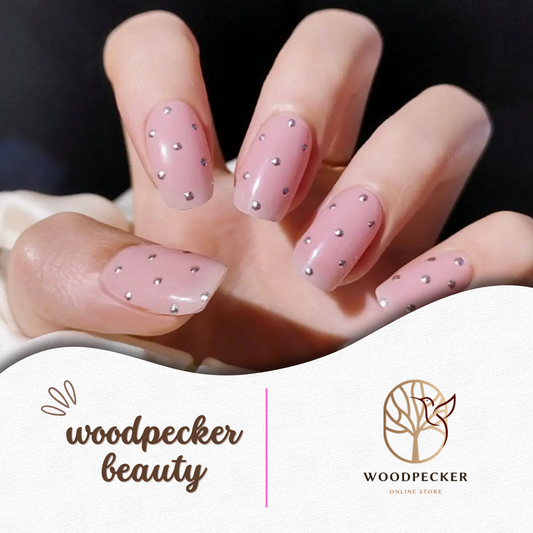 Elegant pink nail stickers with silver rhinestone dots — a simple, chic design perfect for everyday glam or bridal beauty.
