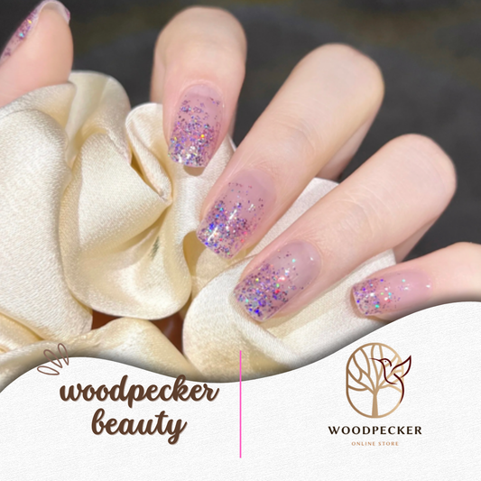Semi-transparent pink and purple glitter nail wraps with a natural gradient finish
