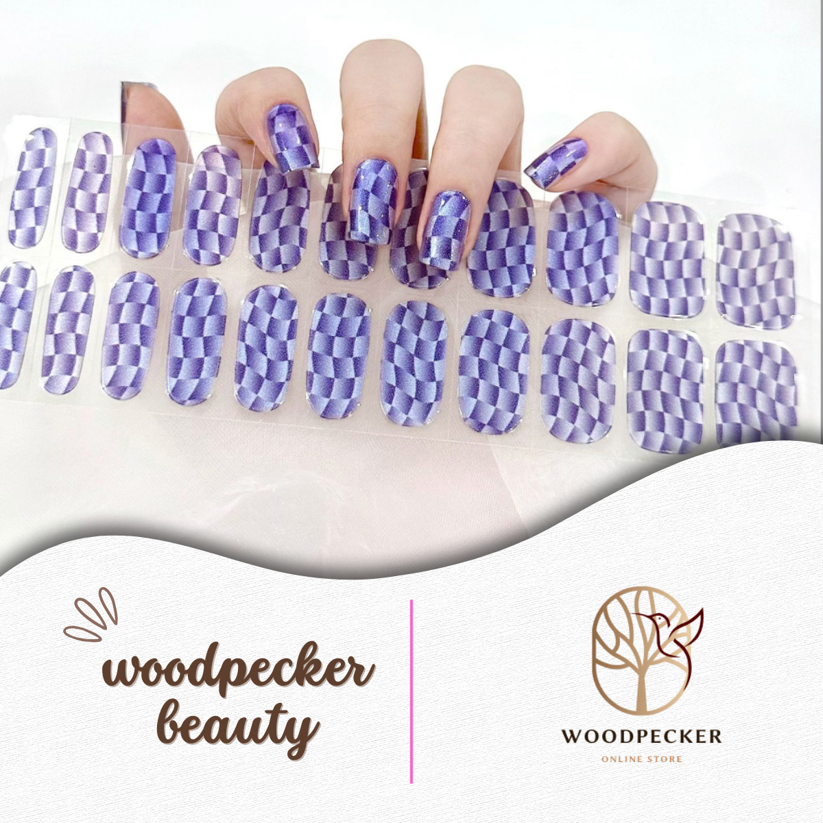 Hand with purple 3D checkerboard pattern semi-cured gel nail wraps, UV lamp required
