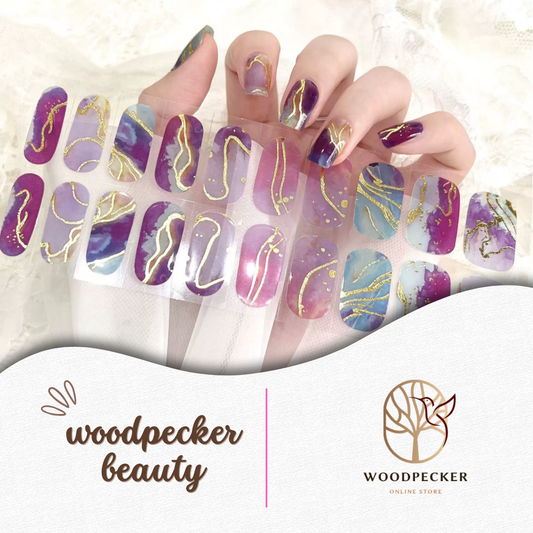 Purple blue marble nail wraps with gold swirl accents by Woodpecker Beauty
