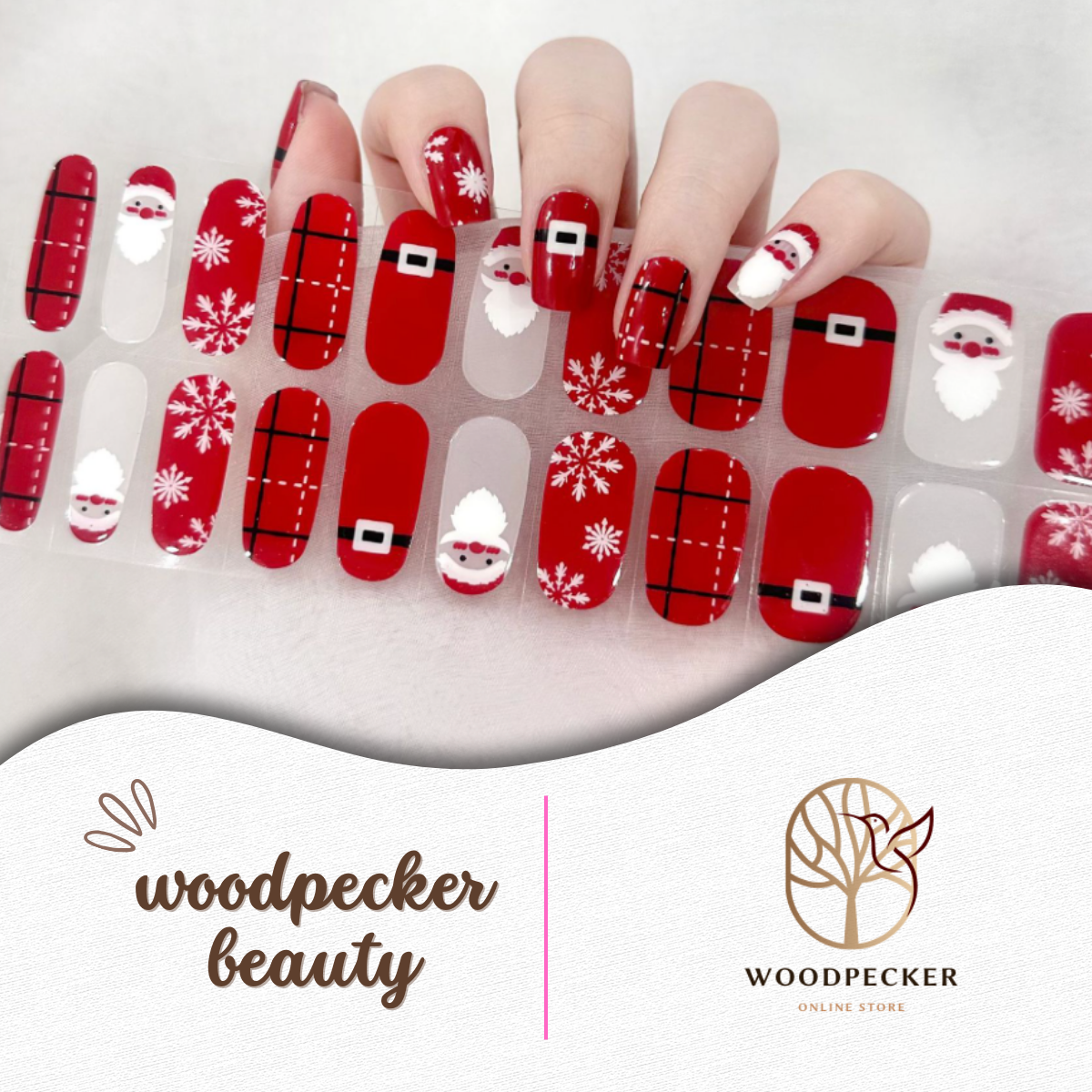 Christmas-themed nail stickers featuring Santa Claus, snowflakes, red plaid, and festive belt designs.
