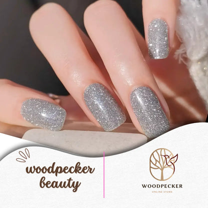 Ultra-sparkly silver glitter nail stickers with a dazzling shine, perfect for parties and winter holidays.
